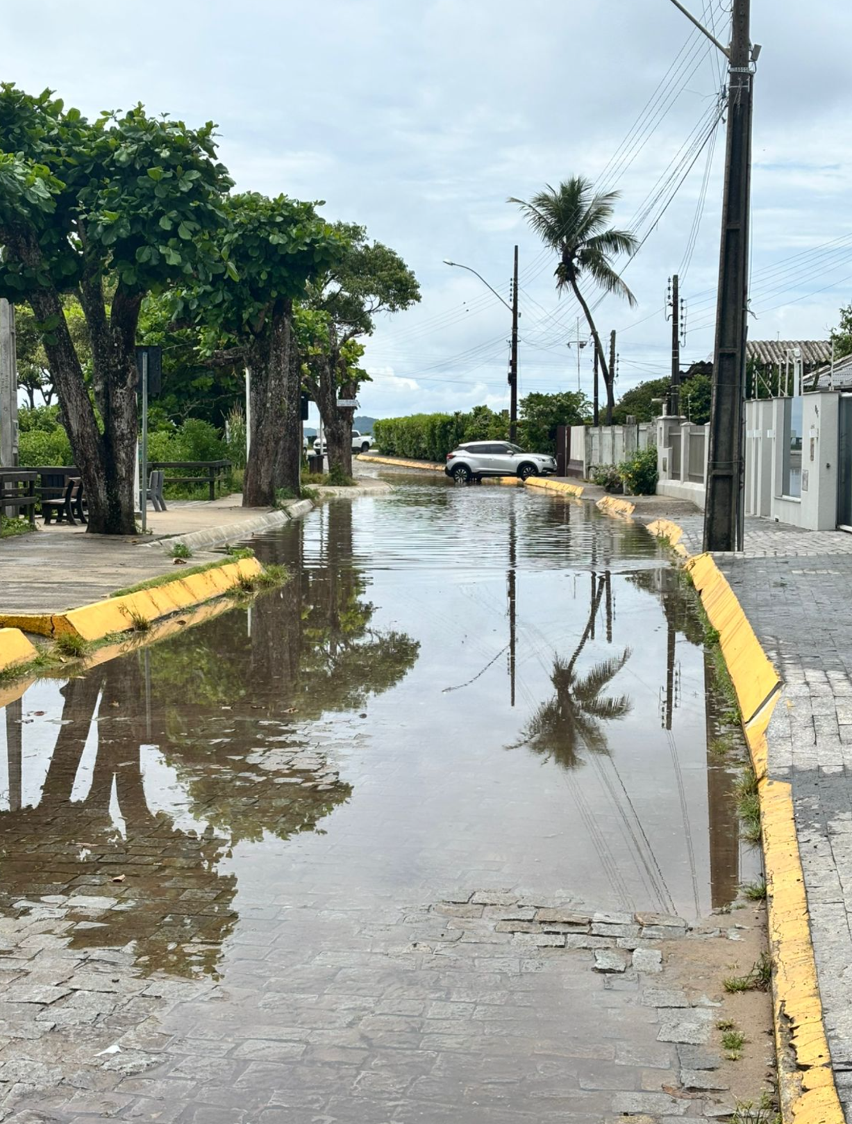 Flooded street in a Brazilian coastal neighborhood